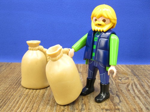 Landwirt mit säcken - mit,